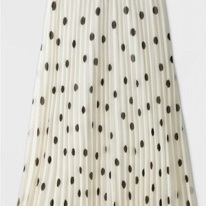 Target New Day Cream with black polka dot skirt